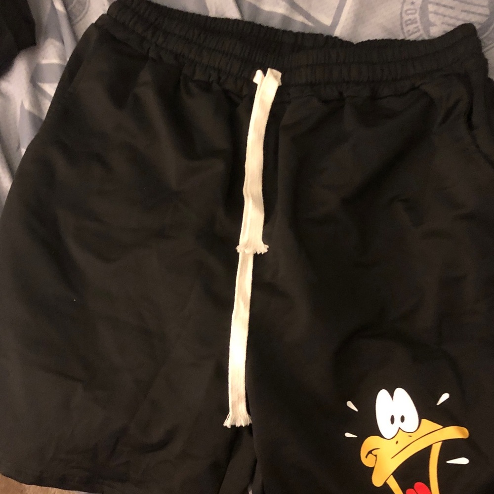 Black Drawstring Shorts with Cartoon Duck Graphic